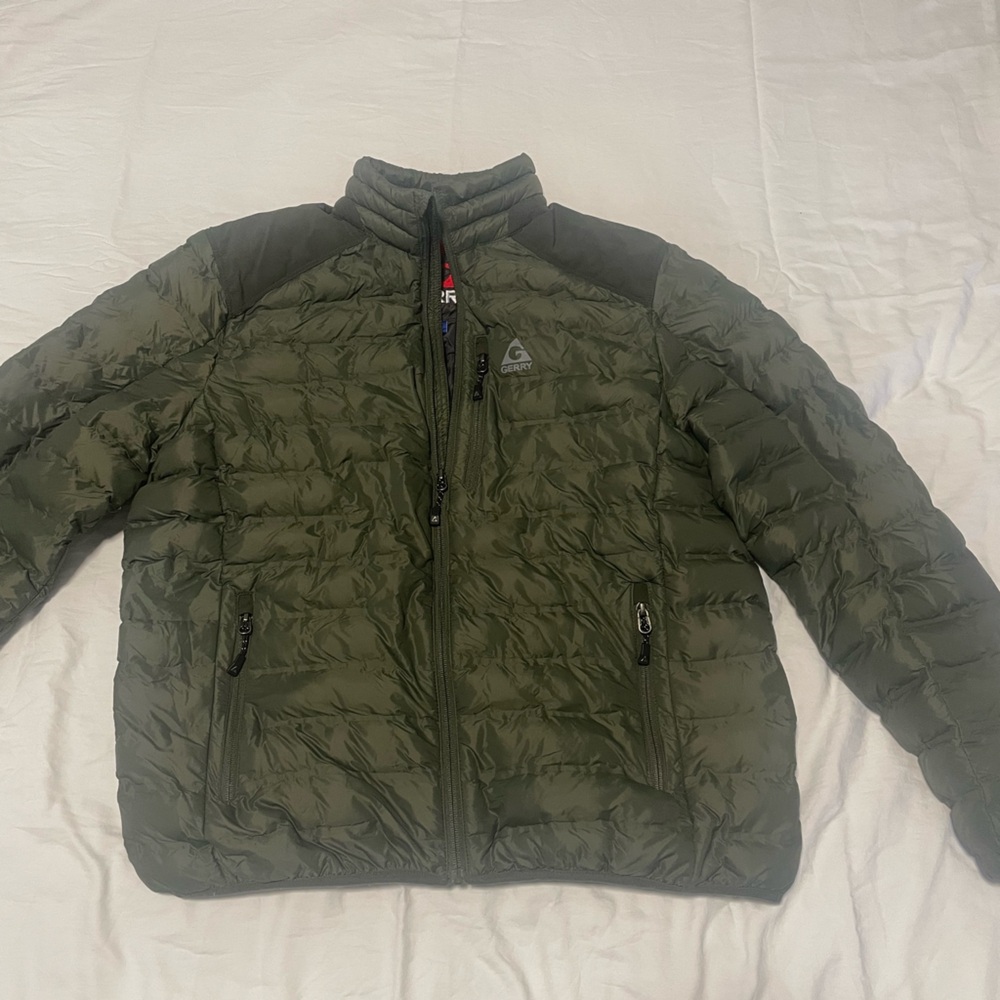 Green men’s water proof jacket.
